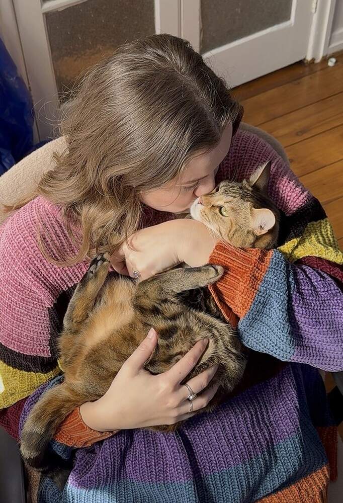 Lauren at home with her cat