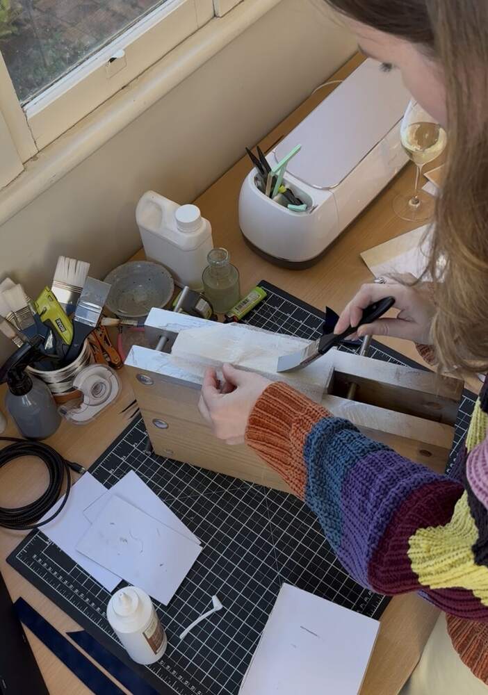 Lauren at her binding desk